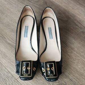 Prada Women's Black Flats with Gold Accents
